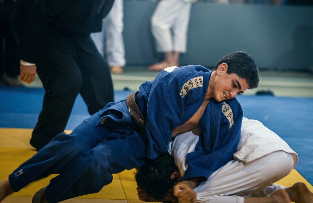 Young Andreas Tricomitis competing in a judo tournament, winning gold at the European A-Tournament U15 50kg in 2005