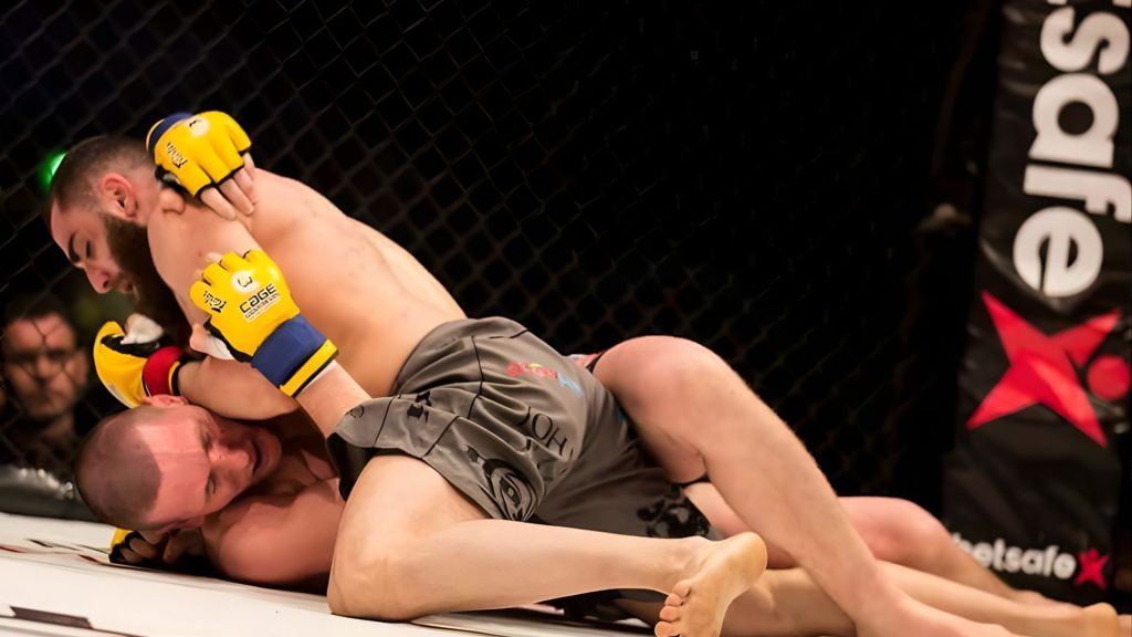 Andreas Tricomitis vs Mark Kinsella fight poster for Cage Warriors 90 in 2018